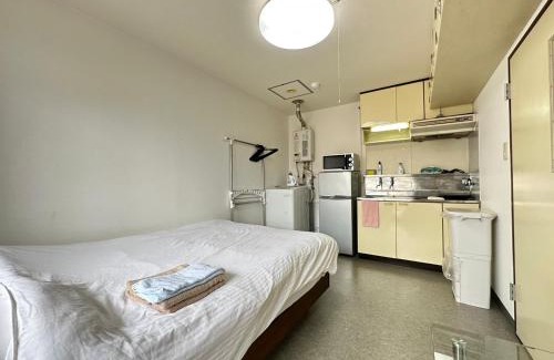 Kita Ward Apartment | Cozy Hokusei Bldg 41: Family-Friendly Retreat Awaits