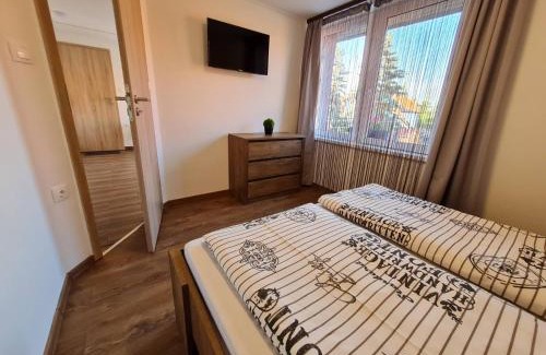 Gyula Apartment | Top-Rated Holdudvar Apartman with Oceanfront Views