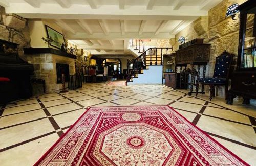 Sabaris Villa | Experience Holibai: Oceanfront Retreat with Historic Charm