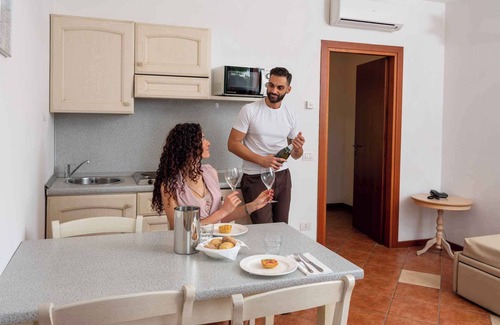 Peschiera del Garda Apartment | Inviting Holiday Apartment with Golf Course & Ocean Views