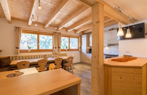Moso in Passiria Apartment | Inviting Holiday Apartment at Hütterwirtshof with Kitchen