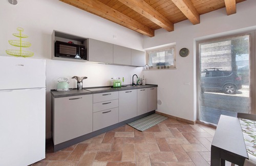 Caprino Veronese Apartment | Inviting Holiday Apartment "Casale La Coccinella Gelsomino" with Garden & Wi-Fi