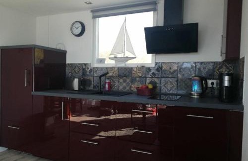 Stavoren Apartment | Family-Friendly Boathouse Holiday Apartment Awaits You
