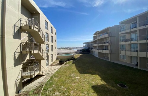 Lagoon Beach Apartment | Beachfront Holiday Apartment with Pool and Spa Amenities