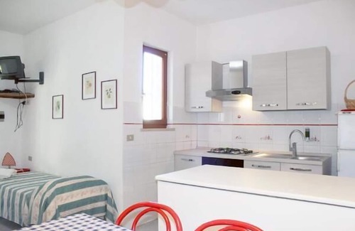 Madonna delle Grazie Apartment | Cozy Holiday Apartment Capoliveri with Ocean View