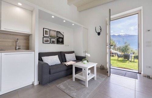 Tignale Apartment | Relaxing Holiday Apartment "Ca’ Scaì Agrifugium Olivia" with Pool