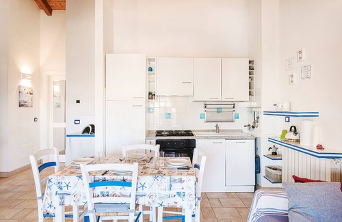 Golfo Aranci Apartment | Oceanfront Apartment with Breathtaking Views & Balcony