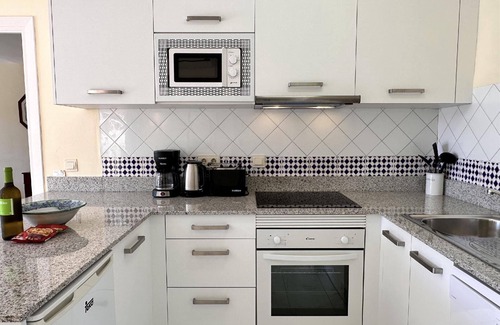 Chimenea Apartment | Cozy Holiday Apartment in Nerja with Pool for 4 Guests
