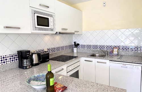 Chimenea Apartment | Cozy Holiday Apartment in Nerja with Pool for 4 Guests