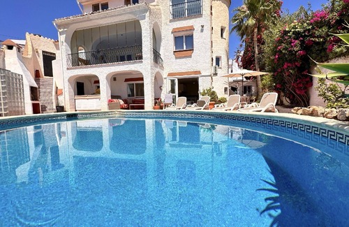 Chimenea Apartment | Cozy Holiday Apartment in Nerja with Pool for 4 Guests