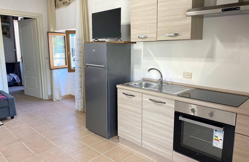 Piombino Other | Cozy Piombino Holiday Apartment for Families with Kitchen