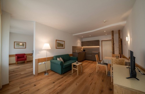 Santa Valburga Apartment | Holiday Apartment 'Pöder Goldlahn' with Mountain View, Balcony, Shared Garden & Wi-Fi
