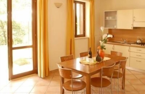 Prabione Apartment | Cozy Tignale Holiday Apartment for Families with Pool Access