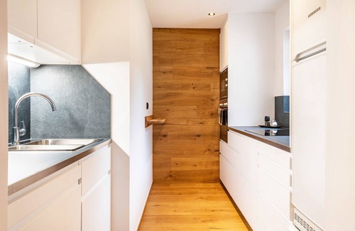 Feldthurns Apartment | Modern Holiday Apartment "Wegscheiderhof" with Mountain Views
