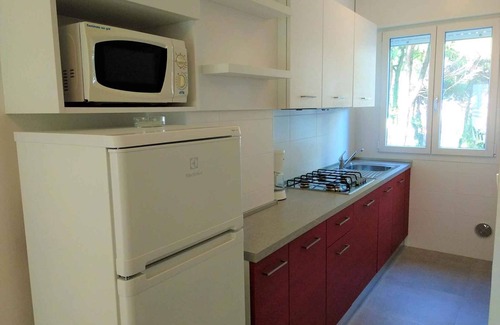 Lignano Sabbiadoro Apartment | Cozy Holiday Apartment with Balcony and Oceanfront Views