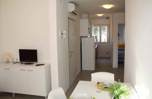 Lignano Sabbiadoro Apartment | Cozy Holiday Apartment with Balcony and Oceanfront Views