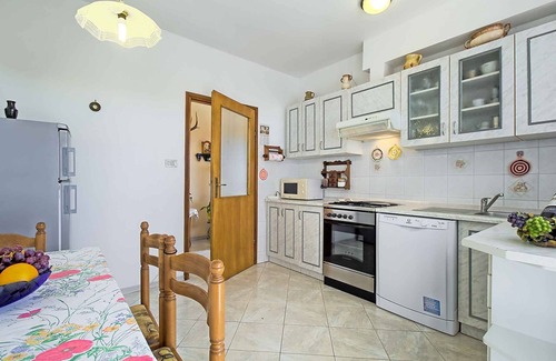 Valica Apartment | Oceanfront Getaway: Family Apartment with Lawn & BBQ
