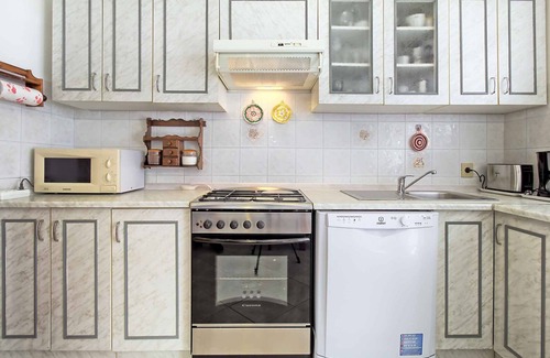 Valica Apartment | Oceanfront Getaway: Family Apartment with Lawn & BBQ
