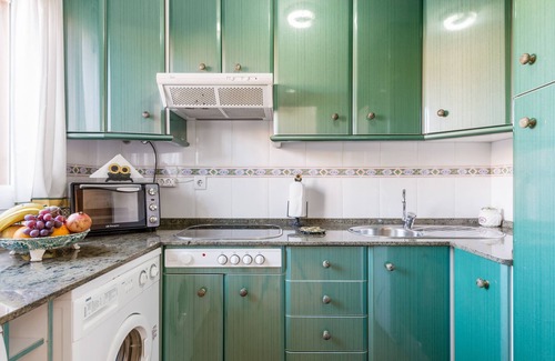 Chiclana de la Frontera Apartment | Elegant "Jardin del Golf" Apartment with Pool Near the Beach