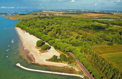 Aquileia Apartment | Inviting Holiday Flat with Pool in Belvedere, Grado