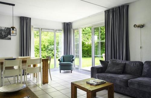 Eernewoude House | Oceanfront Retreat at Bungalowpark It Wiid by Interhome