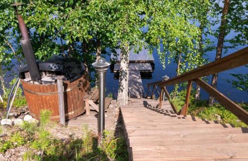 Enonkoski House | Idyllic Hot Pool Cottage Iitu by Interhome - 4 Star Oasis