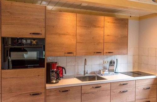 Oosterend House | Charming Lodge in Historic Fishing Village with Ocean View