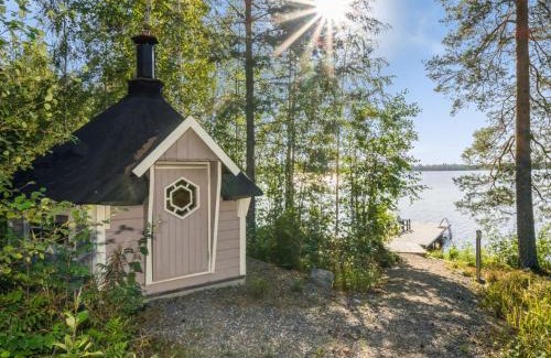Tuusniemi House | Elegant Holiday Home Kärkiniemi with Hot Tub Access