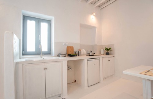 Marpissa House | Holiday Home 'Kalesma Marpissa' with Sea View, Private Terrace and Air Conditioning