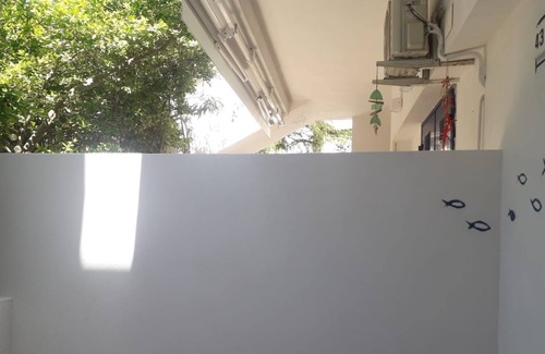 Cozze House | Holiday Home 'La Casa Dei Pesci Blu' with Shared Pool, Wi-Fi and Air Conditioning