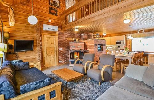 Kehys-Kainuu House | Cozy Holiday Home Laattaja Mökki - Pet Friendly Retreat