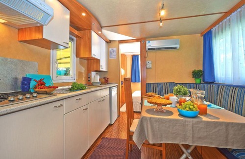 Baia Domizia House | Oceanfront Holiday Home Maxi Caravan Escale with Pool