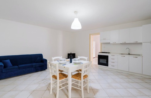 Porto Cesareo House | Holiday Home 'Mery Villaggio Chiusurelle 2' with Shared Pool, Shared Terrace and Air Conditioning