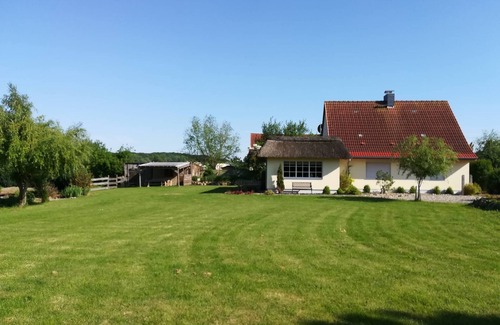 Kalkhorst House | Exclusive Holiday Home "Naturteich Haus" with Private Pond