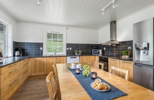 Vik House | Pet-Friendly Holiday Home Odin with Hot Tub & Great Reviews