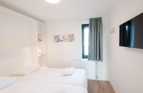 Tholen House | Oceanfront Haven at Holiday Home Oesterdam Resort