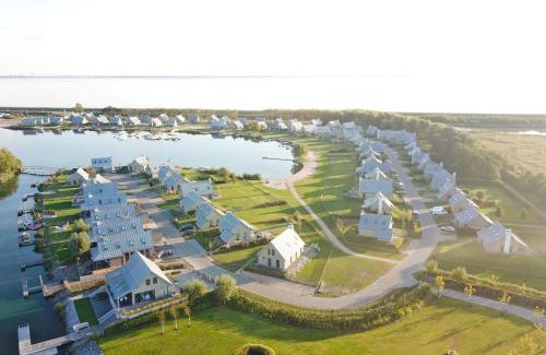 Tholen House | Relax at Holiday Home Oesterdam Resort with Oceanfront Views