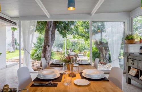 Terrasini House | Premier Holiday Home Quirat with Hot Tub & Family-Friendly Perks