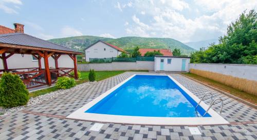 Mostar House | Cozy Holiday Home Simplicity with Oceanfront Pool Access