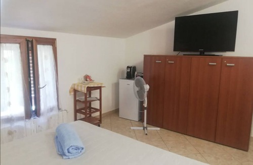 Calangianus House | Inviting Holiday Home 'Tra Montagna e Mare' with Terrace