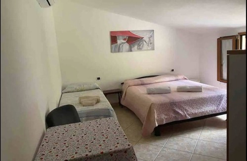 Calangianus House | Inviting Holiday Home 'Tra Montagna e Mare' with Terrace
