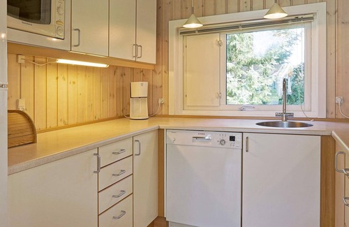 Oster Somarken House | Inviting 12-Person Holiday Home with Ocean Views in Aakirkeby