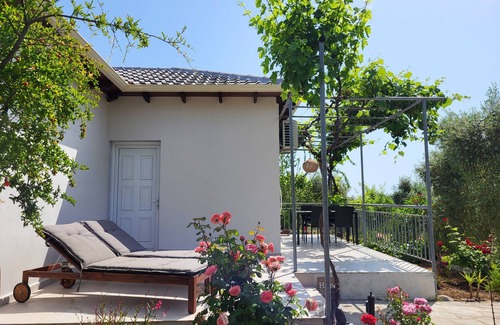 Skala Potamias House | Idyllic Holiday Homes Amidst Olive Grove & Ocean Views