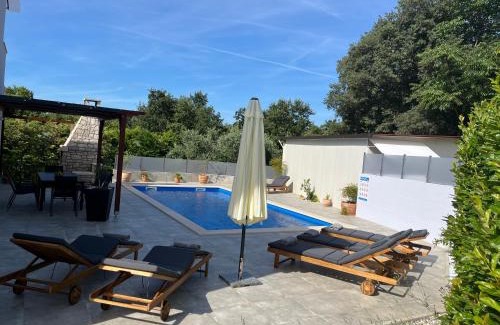 Radini Villa | Discover Holiday House Gabi: Oceanfront Oasis with Pool