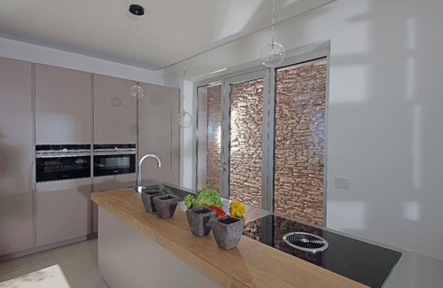 Pulciano House | Spacious Holiday Home in Toscolano-Maderno with Pool