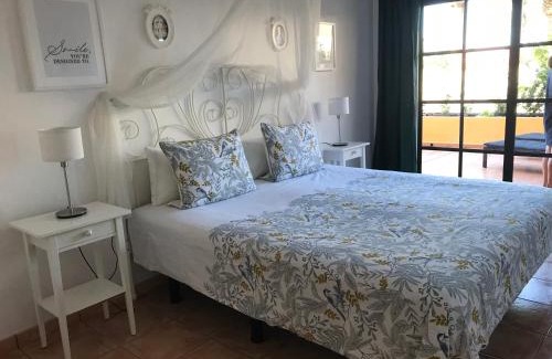 Playa de la Calera Apartment | Relaxing Getaway at Holiday in Playa Calera with Pool