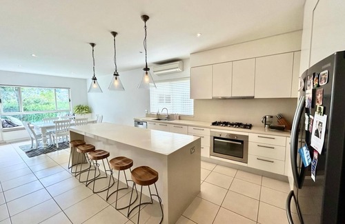 Northwood House | Discover a Harbourside Retreat with Pool and Spa Amenities