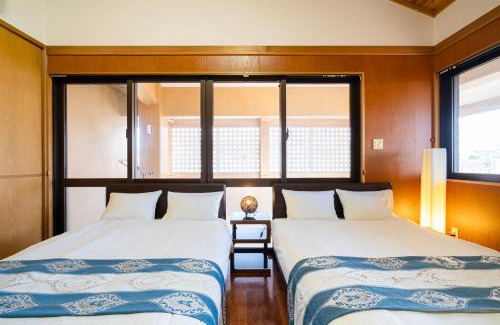 Taketomi-jima Taketomi-cho Villa | Family-Friendly Stay at Holiday Inn Garakuta, Rated 8.8/10