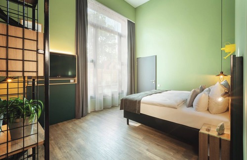 Schoeneberg Hotel | Discover the niu Dwarf: Highly Rated & Family Friendly
