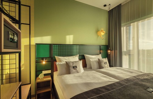 Schoeneberg Hotel | Discover the niu Dwarf: Highly Rated & Family Friendly